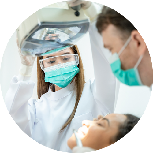 Woman smiling during her dental checkup in Las Vegas