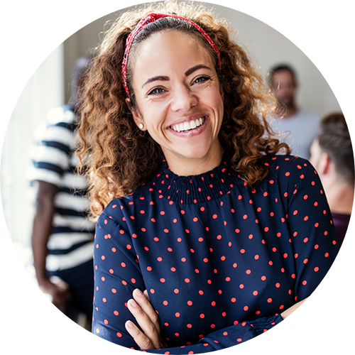 Woman smiling and crossing her arms