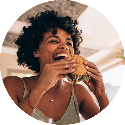 Woman eating a burger
