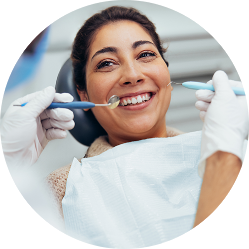 Woman smiling in the dental chair
