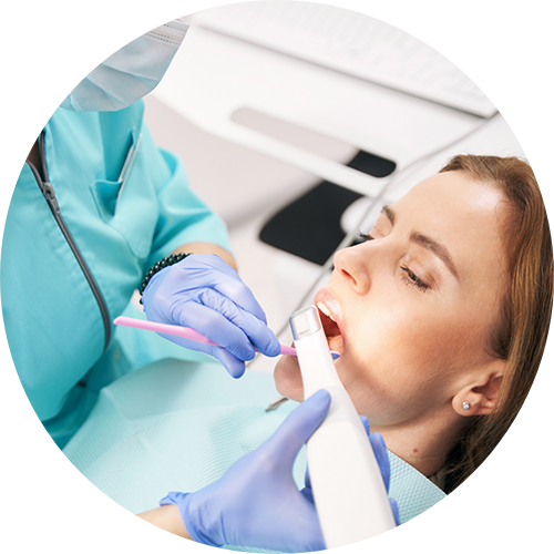 Dentist examining a patient's mouth